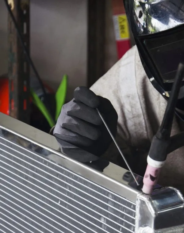 People Use Electricity Welding For Fix And Solder Radiator